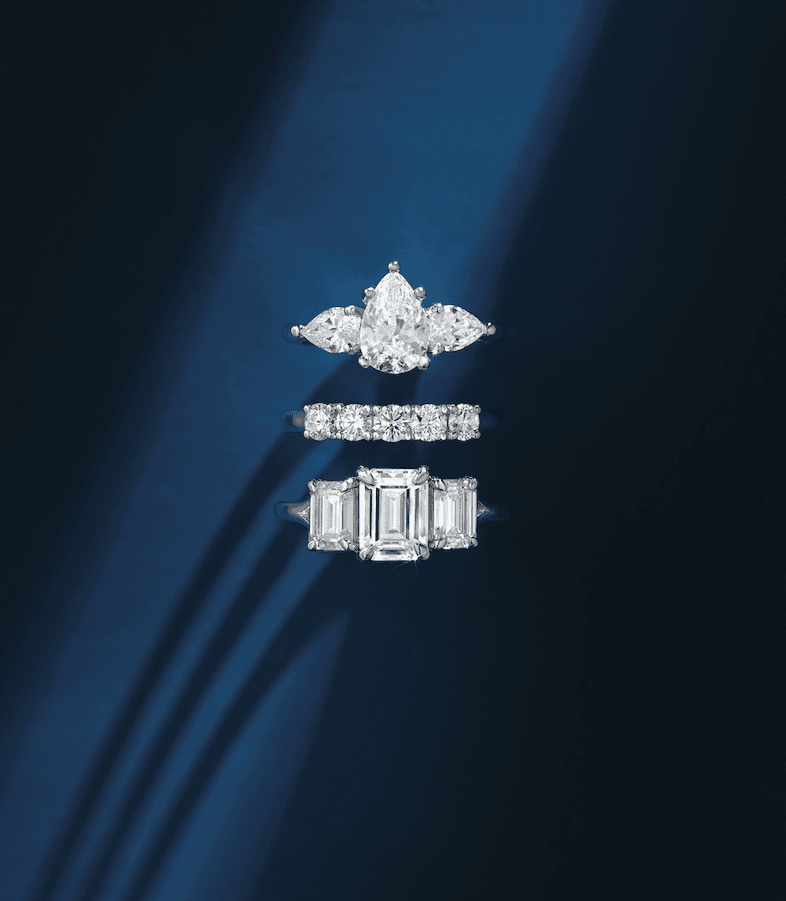 Elegant jewelry display featuring rings and gemstones